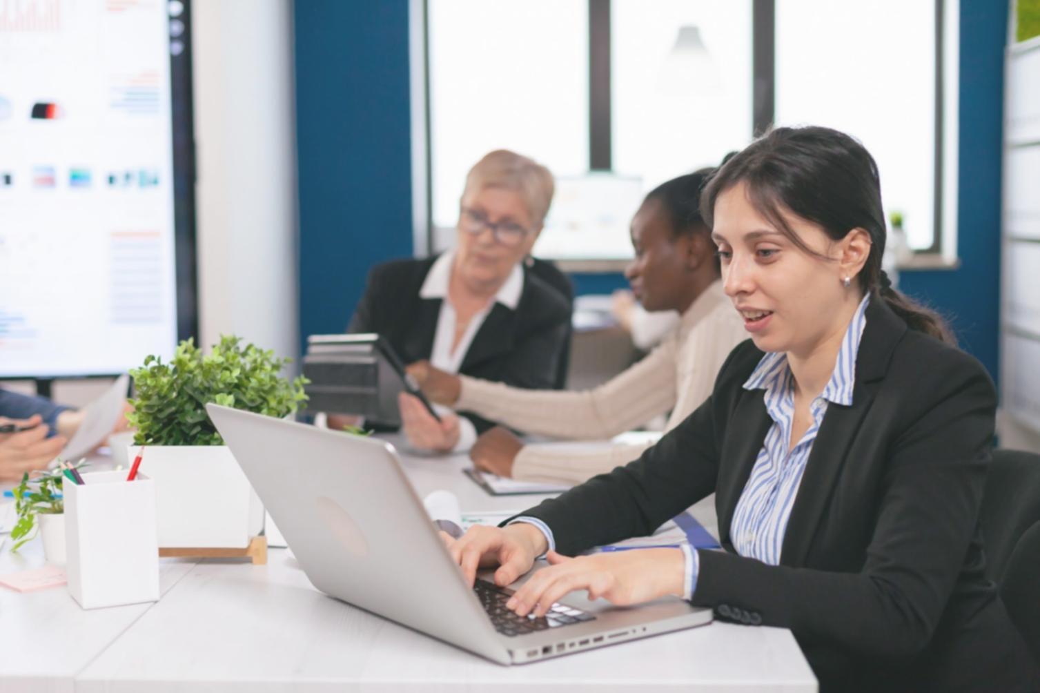 Business professional reviewing financial documents with strategic planning tools